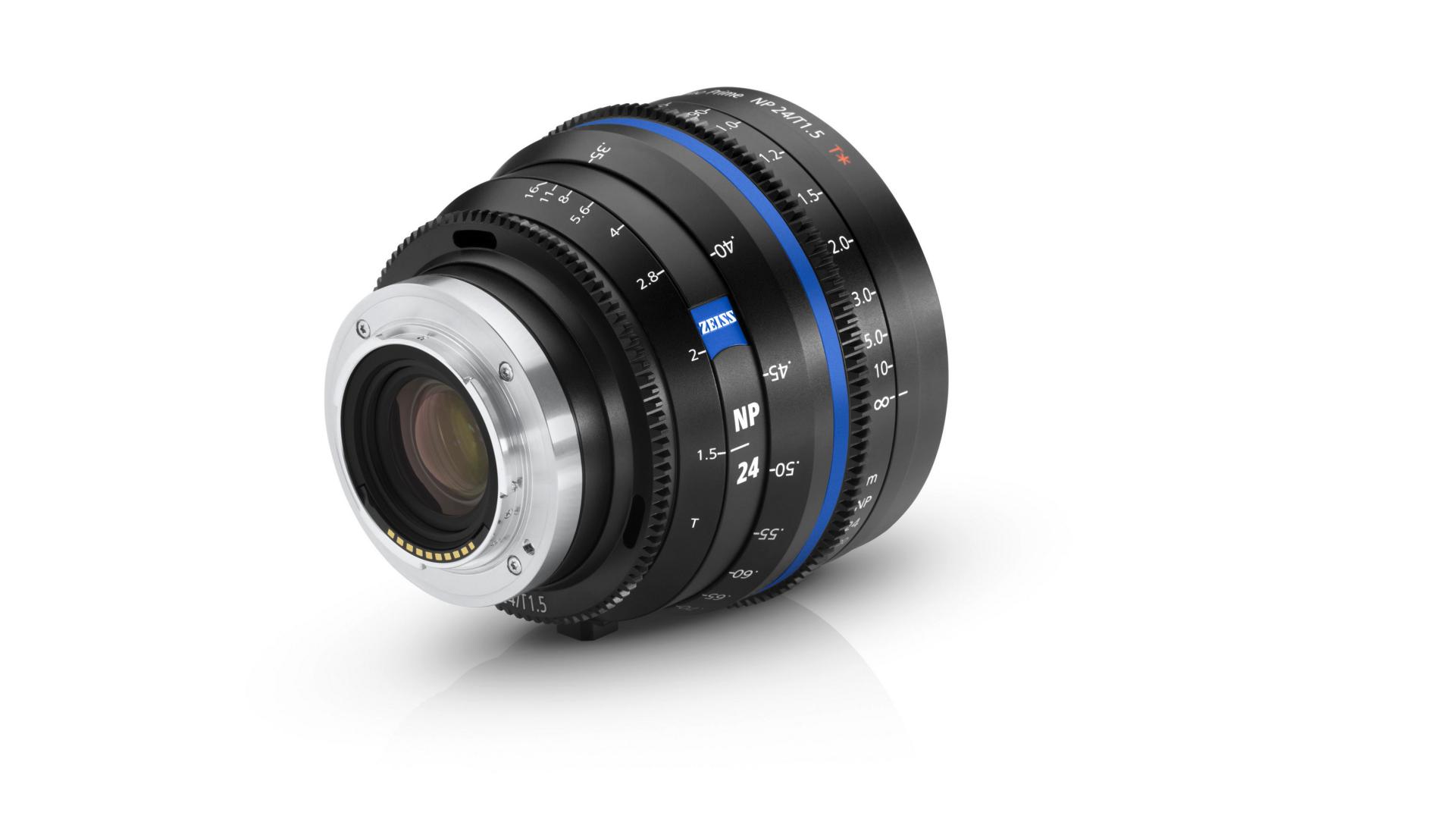 Compact ZEISS cinema lens with metal housing, blue accent ring, and detailed focus and aperture markings.