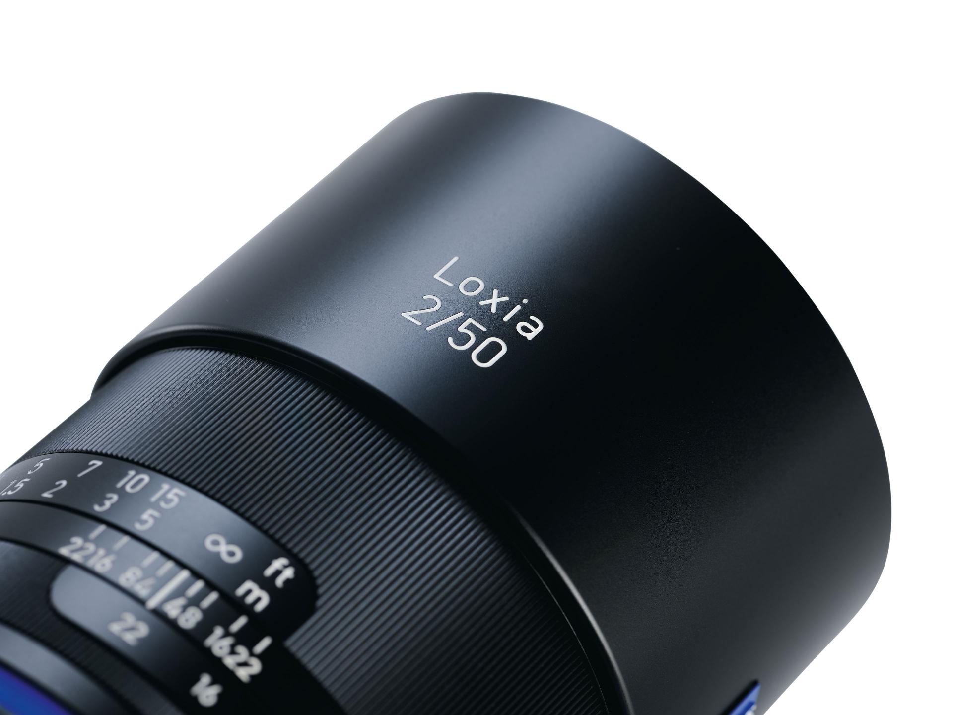 Close-up view of the ZEISS Loxia 2/50 camera lens showcasing its engraved labeling and precision focus ring.