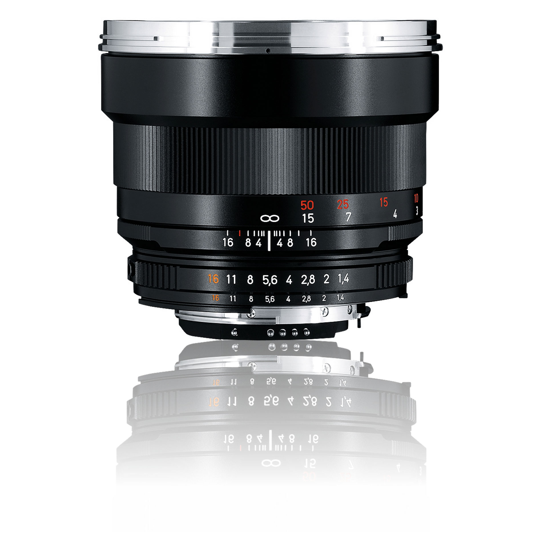 Black ZEISS camera lens with manual focus and aperture control rings, featuring engraved white, red, and orange markings.