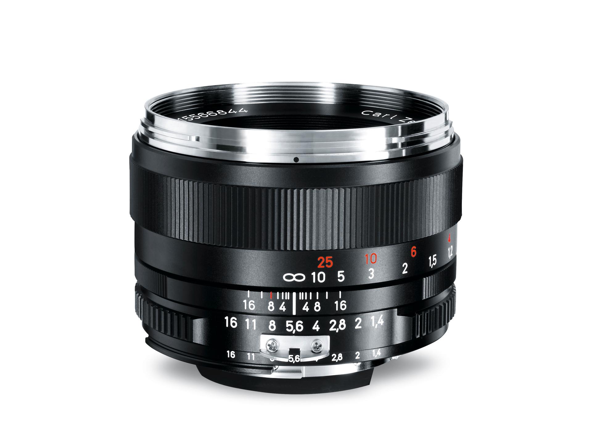 Close-up view of a ZEISS Planar 1.4/50 camera lens with "Carl Zeiss" branding on the lens ring.