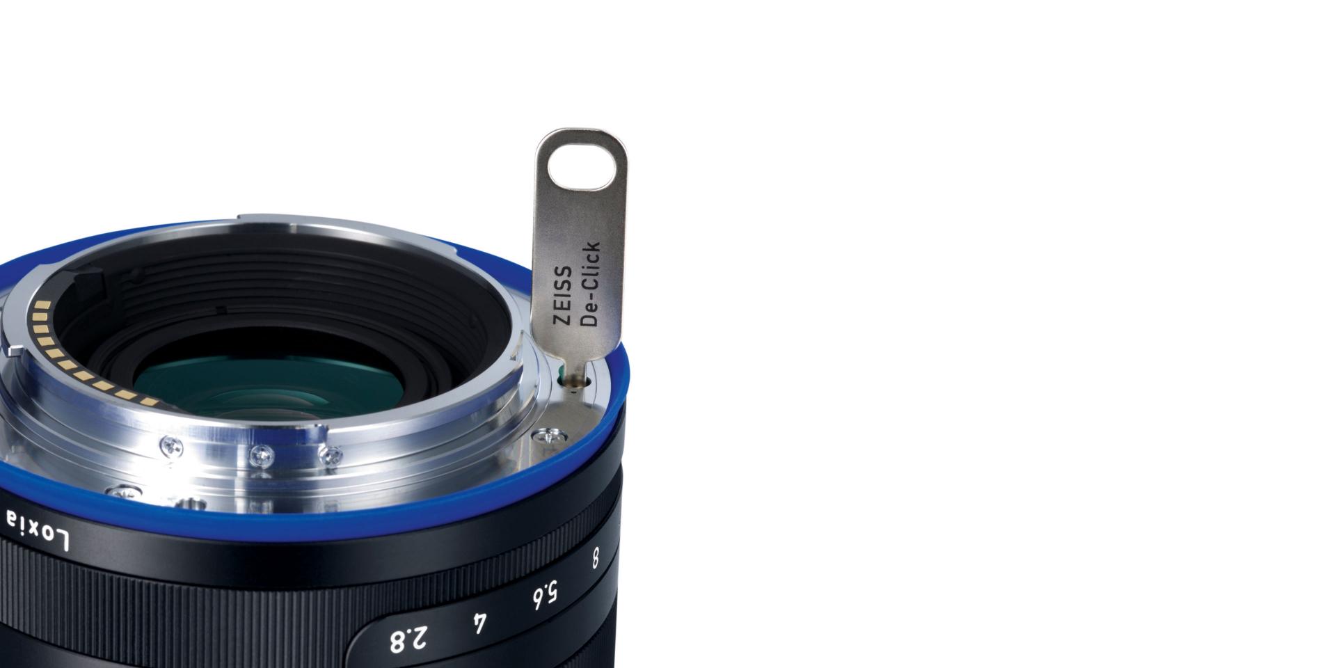Close-up of a ZEISS loxia lens featuring the innovative De-Click gear ring, designed for smooth aperture adjustments in professional video production.