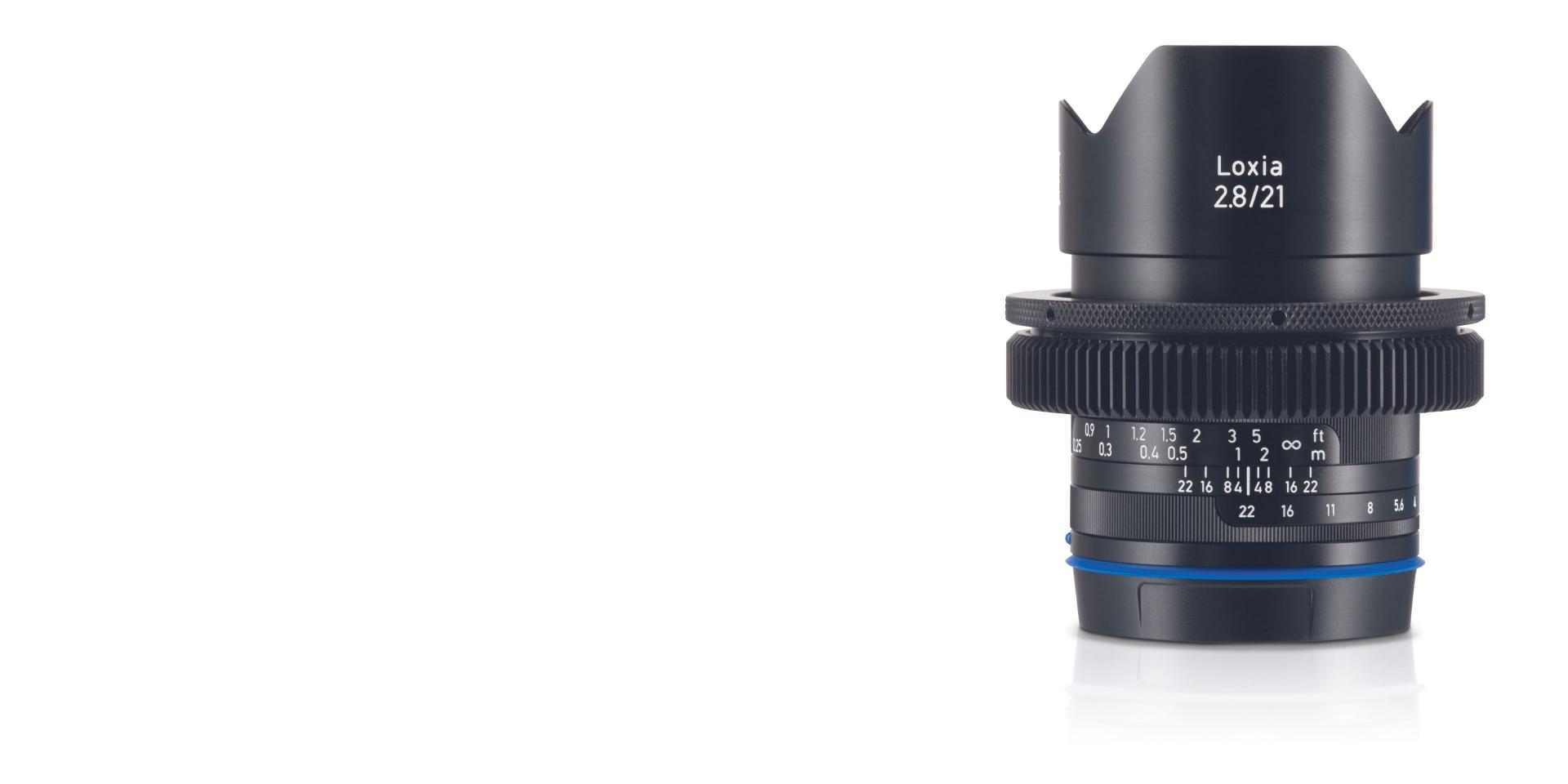 The ZEISS Loxia 2.8/21 lens, featuring a compact design and precision focus ring, engineered for high-resolution photography and videography.