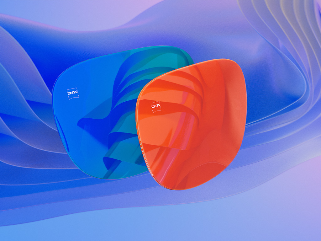 3D CGI-illustratie van twee zonnebrilglazen met een blauwe en een oranje spiegelcoating.