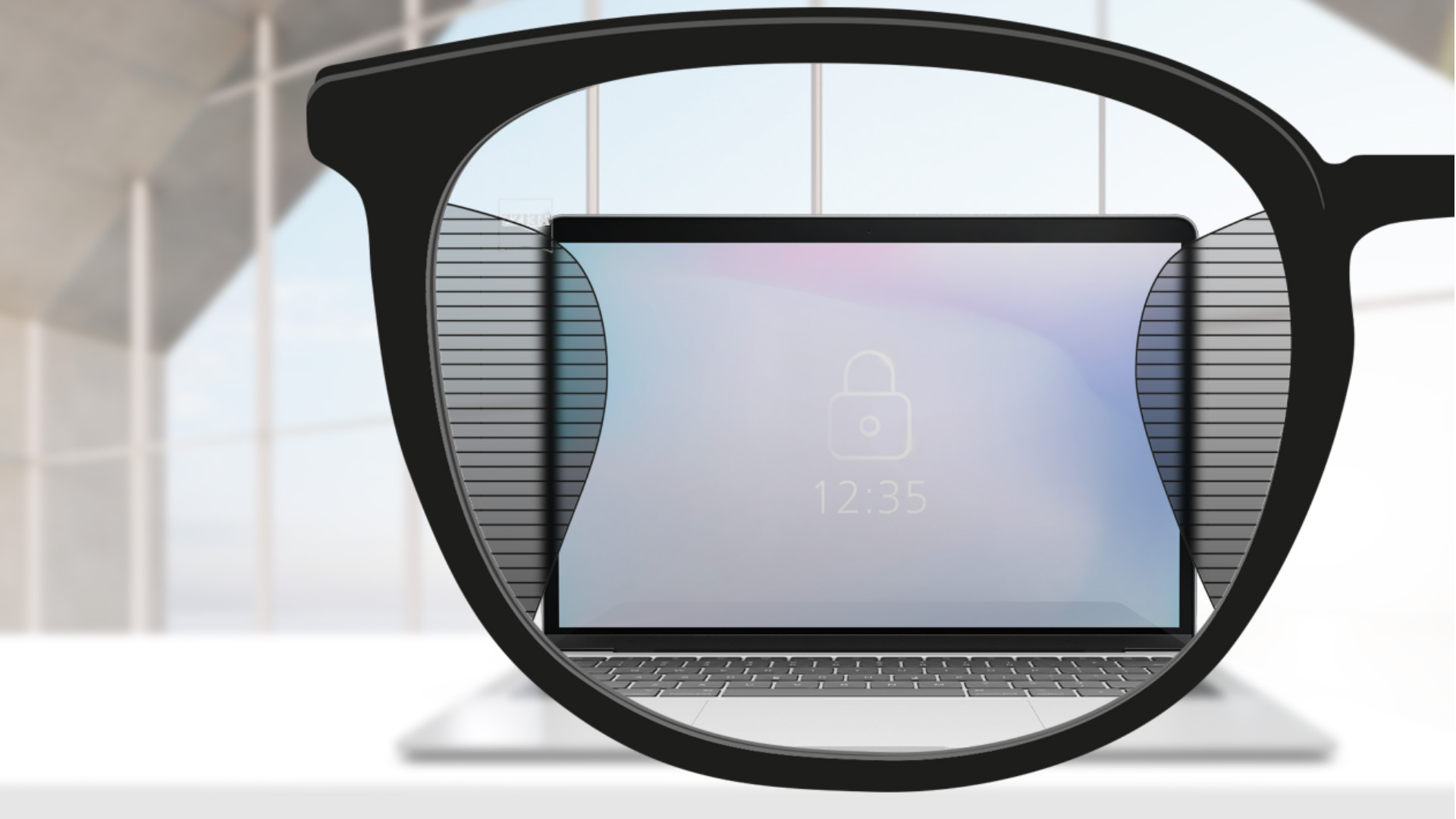 Een point-of-view-beeld met ZEISS Office glazen met een computerscherm in het midden van het objectief en een slank, wazig deel aan de linker- en rechterkant