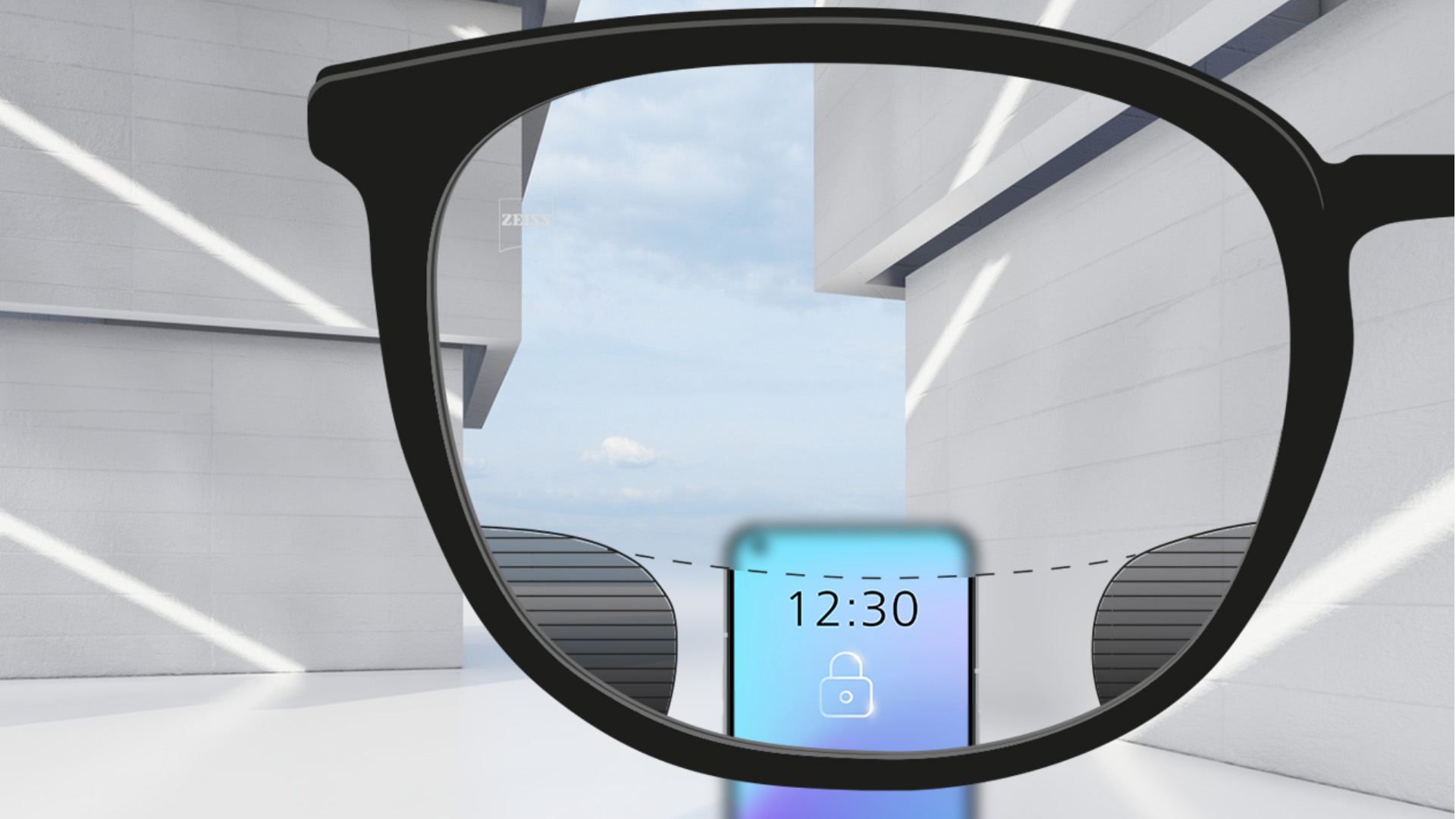 Een point-of-view-beeld met ZEISS Digital SmartLife brillenglazen met een smartphone, waarbij het bovenste en onderste gedeelte van het objectief volledig helder is en  met links en rechts kleine onscherpe percelen.