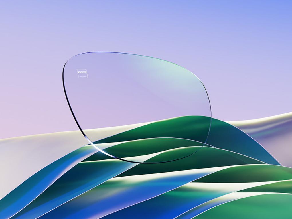 Een CGI afbeelding van een helder brillenglas met een subtiele groene glans