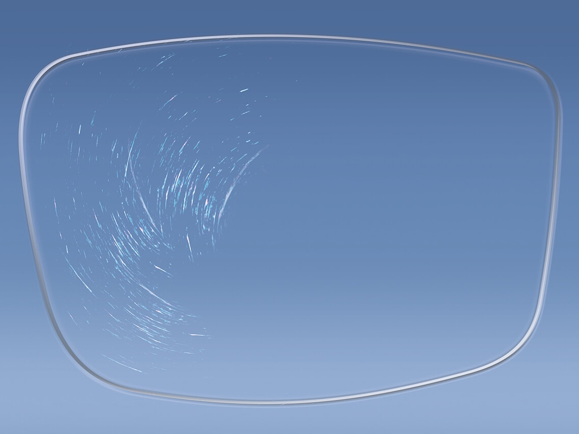 Illustratie van brillenglas met en zonder ZEISS Coatings die de hardheid van het oppervlak beïnvloeden 